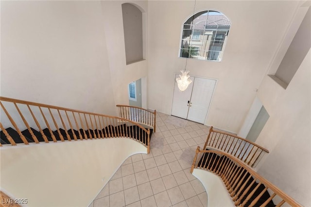 8901 Goldstone Ave, Las Vegas, NV 89143 - tiled entrance foyer featuring a towering ceiling and a chandelier