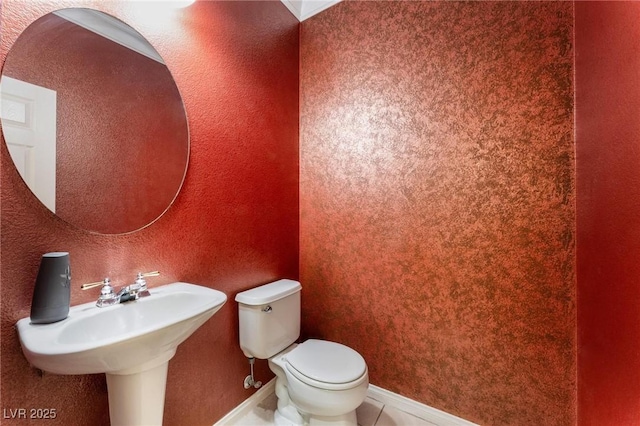 8901 Goldstone Ave, Las Vegas, NV 89143 - bathroom featuring toilet and tile patterned floors