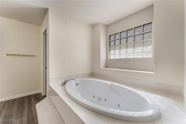 8901 Goldstone Ave, Las Vegas, NV 89143 - full bath featuring wood finished floors and a jetted tub