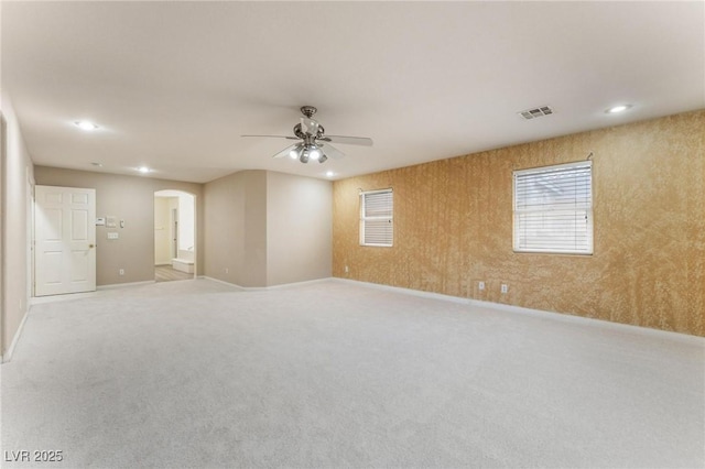 8901 Goldstone Ave, Las Vegas, NV 89143 - carpeted spare room featuring arched walkways, a ceiling fan, and recessed lighting