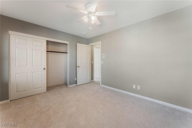 8901 Goldstone Ave, Las Vegas, NV 89143 - unfurnished bedroom with light carpet, a closet, and a ceiling fan