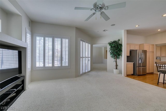 1414 Doggett Ave, Las Vegas, NV 89123 - unfurnished living room with light colored carpet, ceiling fan, and recessed lighting