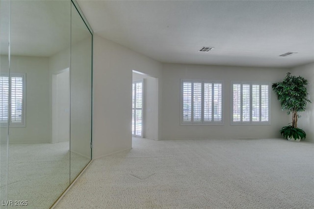1414 Doggett Ave, Las Vegas, NV 89123 - carpeted spare room with plenty of natural light