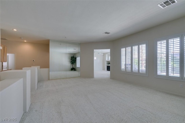1414 Doggett Ave, Las Vegas, NV 89123 - spare room featuring light colored carpet and recessed lighting
