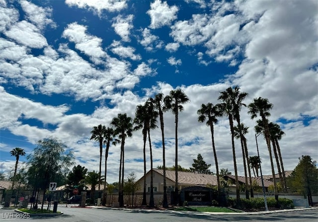 1414 Doggett Ave, Las Vegas, NV 89123 - view of asphalt road featuring traffic signs, curbs, and sidewalks