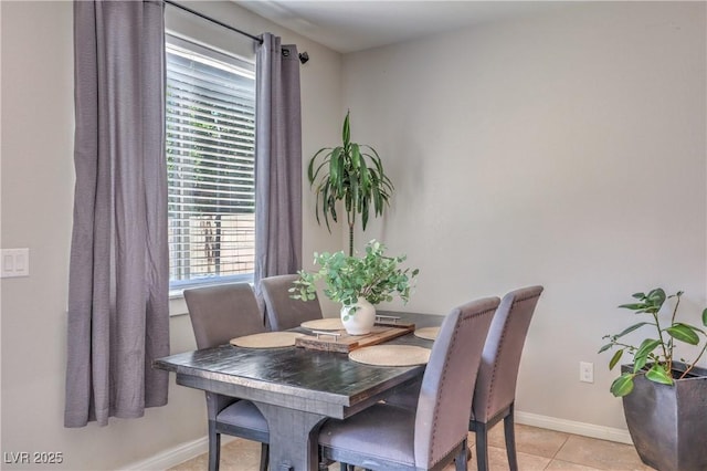 9237 S Chieftain St, Las Vegas, NV 89178 - dining space with baseboards and light tile patterned flooring