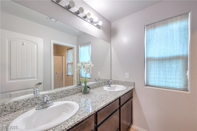 9237 S Chieftain St, Las Vegas, NV 89178 - full bath featuring double vanity and plenty of natural light