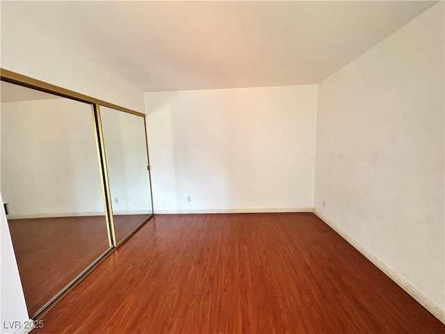 4320 Gannet Cir Unit 116, Las Vegas, NV 89103 - unfurnished bedroom with wood finished floors and a closet