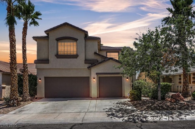 5209 Mantua Ct, Las Vegas, NV 89130 - view of front of home with stucco siding and driveway