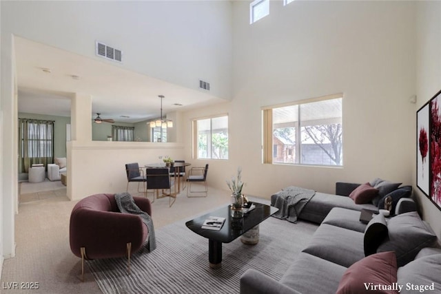5209 Mantua Ct, Las Vegas, NV 89130 - living room with carpet, a high ceiling, and ceiling fan