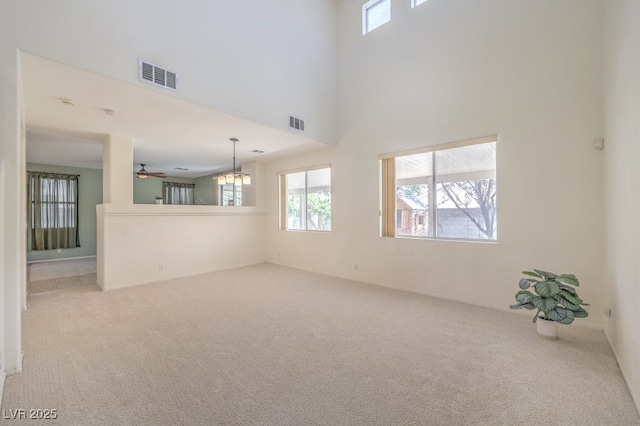 5209 Mantua Ct, Las Vegas, NV 89130 - empty room with carpet, plenty of natural light, ceiling fan, and a high ceiling