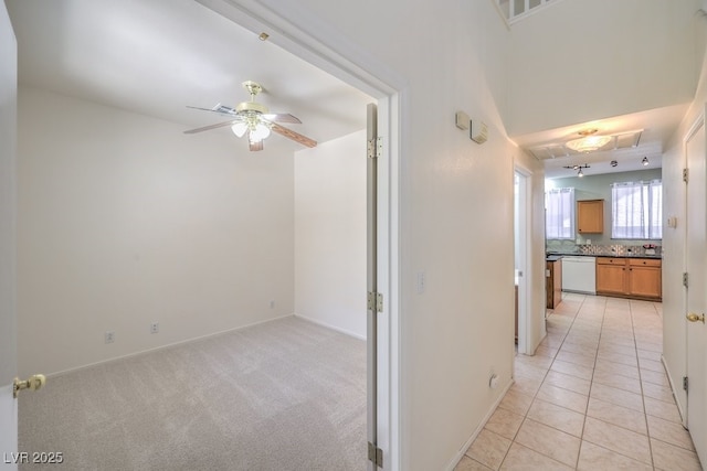 5209 Mantua Ct, Las Vegas, NV 89130 - hallway with baseboards and light tile patterned floors
