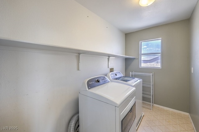 5209 Mantua Ct, Las Vegas, NV 89130 - washroom with washing machine and dryer and baseboards