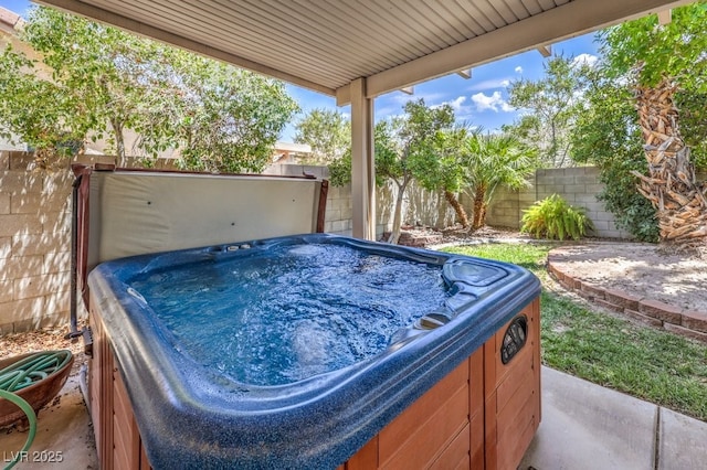 5209 Mantua Ct, Las Vegas, NV 89130 - fenced backyard with a hot tub and grilling area