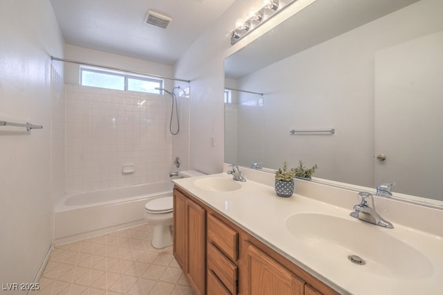 5209 Mantua Ct, Las Vegas, NV 89130 - bathroom featuring double vanity, tub / shower combination, and tile patterned floors