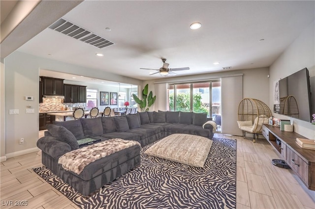 913 Silent Sunset Ave, North Las Vegas, NV 89084 - living room with a ceiling fan, healthy amount of natural light, recessed lighting, and wood finish floors