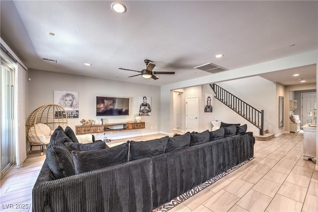 913 Silent Sunset Ave, North Las Vegas, NV 89084 - living room with stairway, a ceiling fan, and recessed lighting