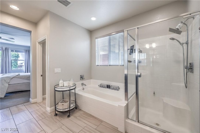 913 Silent Sunset Ave, North Las Vegas, NV 89084 - full bath featuring a stall shower, a garden tub, ensuite bath, a ceiling fan, and recessed lighting