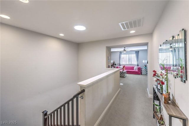 913 Silent Sunset Ave, North Las Vegas, NV 89084 - hallway with carpet floors, recessed lighting, and an upstairs landing