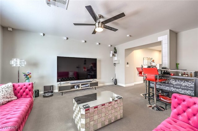 913 Silent Sunset Ave, North Las Vegas, NV 89084 - carpeted living room with ceiling fan and baseboards