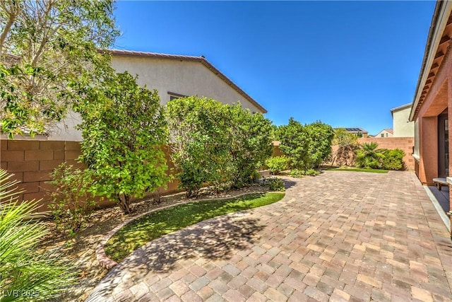 913 Silent Sunset Ave, North Las Vegas, NV 89084 - fenced backyard with a patio