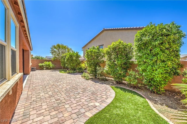 913 Silent Sunset Ave, North Las Vegas, NV 89084 - fenced backyard featuring a patio area