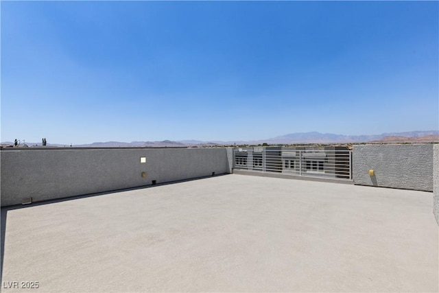 8144 Monsoon Bay St, Las Vegas, NV 89113 - view of patio / terrace with a mountain view