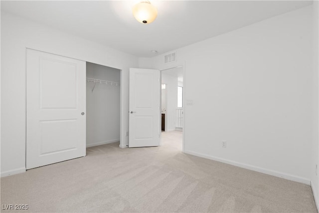 8144 Monsoon Bay St, Las Vegas, NV 89113 - unfurnished bedroom featuring light colored carpet and a closet