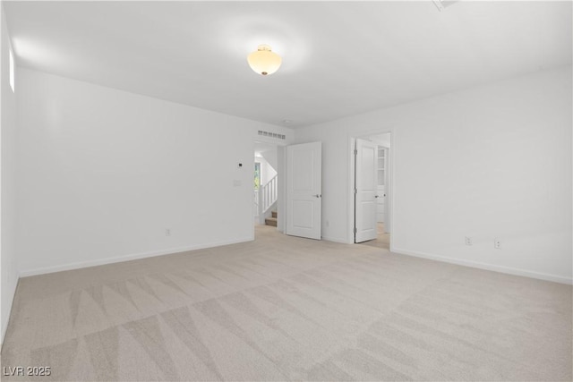 8144 Monsoon Bay St, Las Vegas, NV 89113 - empty room with light colored carpet and baseboards
