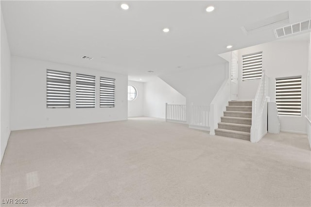 8144 Monsoon Bay St, Las Vegas, NV 89113 - unfurnished living room with light carpet and recessed lighting