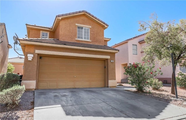 4130 Neighborly Ct, North Las Vegas, NV 89032 - view of front of home featuring driveway, stucco siding, a garage, and a tile roof