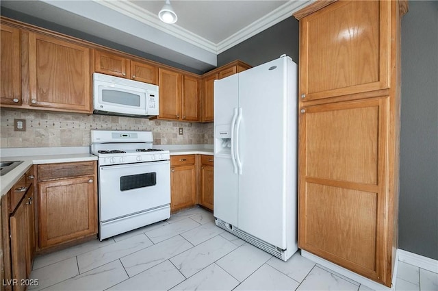 4130 Neighborly Ct, North Las Vegas, NV 89032 - kitchen featuring white appliances, light marble finish flooring, crown molding, brown cabinets, and light countertops