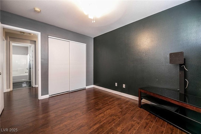 4130 Neighborly Ct, North Las Vegas, NV 89032 - unfurnished bedroom featuring wood finished floors and a closet