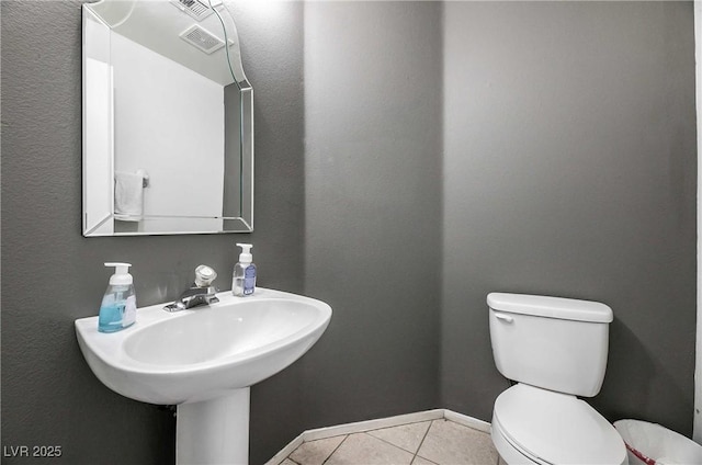 4130 Neighborly Ct, North Las Vegas, NV 89032 - half bathroom with toilet and tile patterned floors