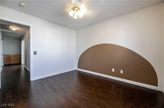 4130 Neighborly Ct, North Las Vegas, NV 89032 - spare room featuring a smoke detector, dark wood-style flooring, and a ceiling fan