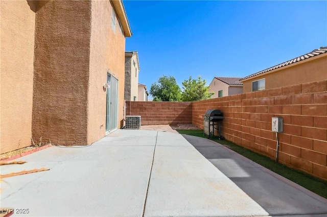 4130 Neighborly Ct, North Las Vegas, NV 89032 - fenced backyard featuring grilling area and a patio area