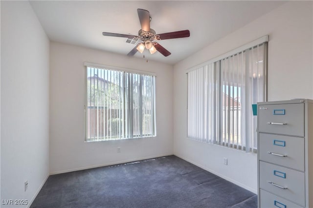 3813 Jasmine Heights Ave, North Las Vegas, NV 89081 - empty room with ceiling fan and dark colored carpet