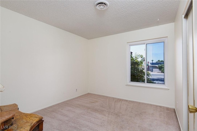 2157 Mccoig Ave, Las Vegas, NV 89119 - carpeted spare room featuring a textured ceiling