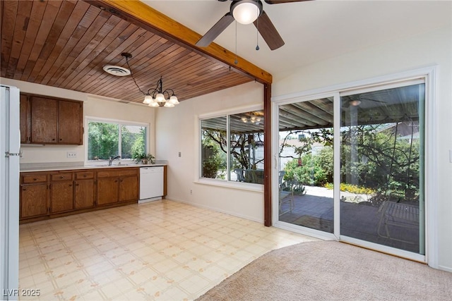 2157 Mccoig Ave, Las Vegas, NV 89119 - kitchen featuring white appliances, light flooring, ceiling fan, light countertops, and a chandelier
