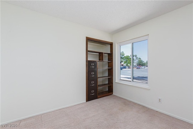 2157 Mccoig Ave, Las Vegas, NV 89119 - spare room featuring carpet and baseboards