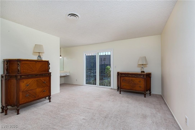 2157 Mccoig Ave, Las Vegas, NV 89119 - living area featuring carpet floors and a textured ceiling