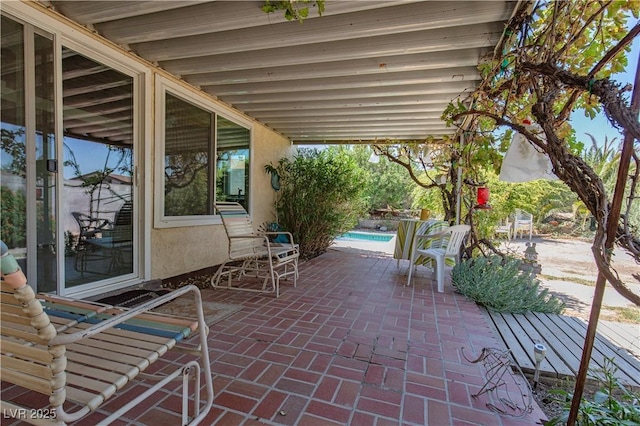 2157 Mccoig Ave, Las Vegas, NV 89119 - view of patio / terrace with an outdoor pool