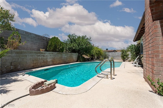 2157 Mccoig Ave, Las Vegas, NV 89119 - view of pool with a fenced backyard and a patio area