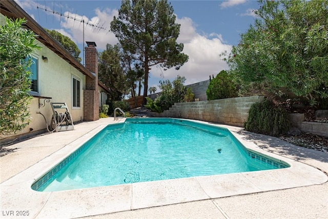 2157 Mccoig Ave, Las Vegas, NV 89119 - view of swimming pool featuring a fenced backyard and a patio area