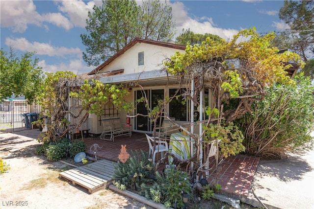 2157 Mccoig Ave, Las Vegas, NV 89119 - view of front of property featuring stucco siding and a wooden deck