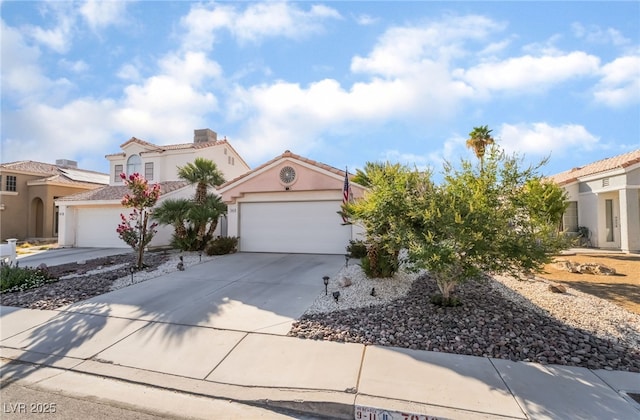 7048 Harbor View Dr, Las Vegas, NV 89119 - mediterranean / spanish-style house featuring concrete driveway, an attached garage, and stucco siding
