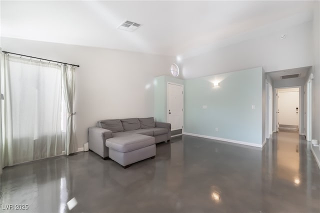 7048 Harbor View Dr, Las Vegas, NV 89119 - living area with concrete flooring and baseboards