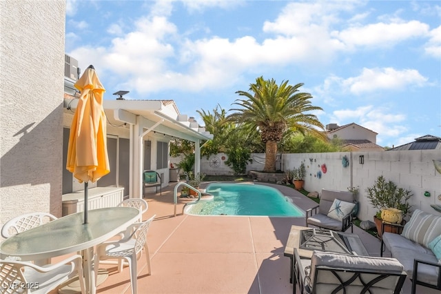 7048 Harbor View Dr, Las Vegas, NV 89119 - view of pool featuring a patio, a fenced backyard, and outdoor lounge area