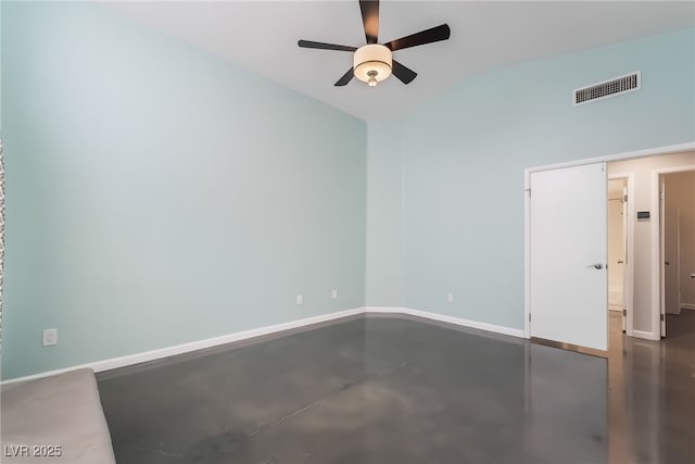 7048 Harbor View Dr, Las Vegas, NV 89119 - empty room featuring a ceiling fan, lofted ceiling, and finished concrete floors