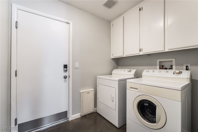 7048 Harbor View Dr, Las Vegas, NV 89119 - laundry room with cabinet space and washer and clothes dryer